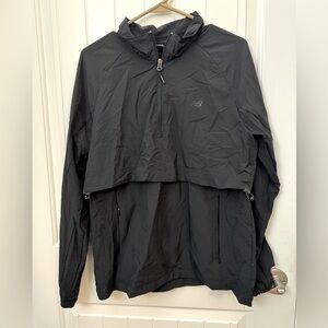 Women’s New Balance 1/4 Zip Hooded Pullover Size medium black.